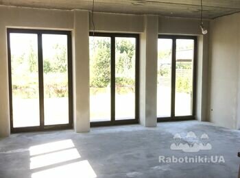 Машинна штукатурка стін будинків