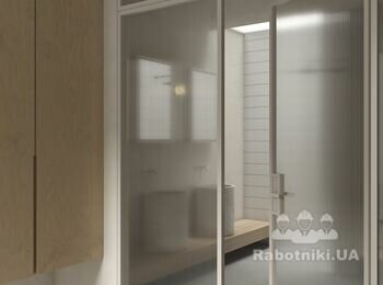 Проект: RYB apartment
Локация: Kyiv (UA)
Тип: Residential
Площадь: 100 m2
Год: 2021

Апартаменты находятся в ЖК Rybalsky в Подольском районе города Киева. Так как квартира расположена над коммерцией у нас была возможность использовать пространство более вариативно. Мы разделили весь объём на два блока приватная часть (которая включает детскую и спальню с ванной) и общественная (которая включает просторную кухню-гостиную, санузел и рабочее место). 

Весь дизайн создан с учетом потребностей заказчиков и становится средой для различных сценариев их повседневной жизни. Все основные помещения композиционно связаны друг с другом за счет материалов и фактур.

Нашей команде было поручено спроектировать место, которое могло бы стать тихим убежищем для владельца и его семьи, где они могли бы отступить от своего космополитического образа жизни.
Основная цель заключалась в создании чистой, минималистичной, но неформальной атмосферы, основанной на натуральных материалах. 
В разработке интерьера были задействованы как иностранные фабрики, как Belid, DCW, &tradition, Verpan, Zanotta, RBW и Menu так и украинские, как Zegen и Interia.
Чтобы добиться гибкости и избежать ненужного разделения этой и без того компактной квартиры, перегородки были почти полностью удалены, создавая открытую планировку с одним центральным модулем, определяющим основное жилое пространство. Данный модуль состоит из функционального кухонного гарнитура, обеденной зоны, компактного рабочего места и просторной гостиной. Данное пространство объединяет несколько функций без лишнего беспорядка. 

Все комнаты кроме детской направлены во внутренние дворы с обилием зелени. Из детской открывается живописный вид на Днепр. В скором времени после поступления в вуз эта комната будет предназначена как место для медитаций для родителей. В данной комнате мы расположили рабочее место таким образом, чтобы естественный свет способствовал комфортной работе. 

Чтобы зрительно связать помещения в одно целое мы использовали единую палитру материалов берёзовая фанера, микроцемент, японская плитка KitKat и мрамор Caribbean Calcite. С их помощью создается лаконичный фон для элементов мебели и света. Прохладные тона микроцемента во всех комнатах мы сбалансировали теплыми текстурами штукатурки и дерева. 

Комбинация примечательных предметов, таких как обеденные стулья Fritz Hansen, кресла Co от Norm Architects и торшера Apollo 180 от Pholc легко сочетаются с индивидуально разработанной мебелью от нашего бюро. Архитектурный характер интерьера дополнительно подчеркивается и усиливается проникающим внутрь солнечным светом. Последовательная композиция, основанная на палитре натуральных материалов, образует комфортную жилую среду, щедро оживленную меняющимся естественным освещением.

Одним из основных изменений, реализованных в рамках проекта, стало объединение 3х санузлов в 2 более просторных и избавление от лишних перегородок. Такая реорганизация пространства позволила увеличить количество естественного света, проникающего в основное жилое пространство. Мы использовали стеклянные перегородки чтобы не препятствовать естественному свету, который наполняет спальню.

Ванную комнату, сдержанную и однотонную, украшает японская мозаичная плитка. Использование оттенков серого способствует успокаивающей атмосфере, которая будет продолжать развиваться по мере того, как обитатели будут наполнять пространство собой. Таким образом, новая планировка адаптирована к современному образу жизни.