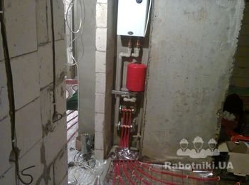 Монтаж електрокотла и колектора теплого пола 50 кв м