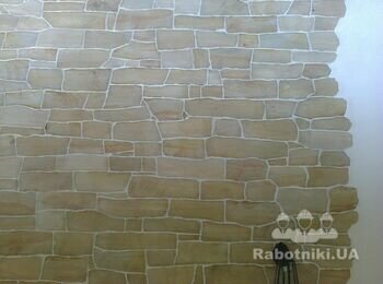 Облицювання стіни штучним каменем