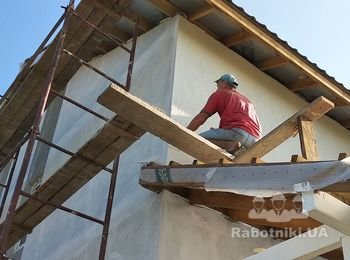 Нанесение декоративной штукатурки на фасаде