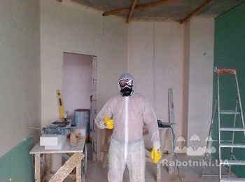 Экипировка мастера при монтаже мин ваты.