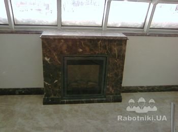 камин из мрамора