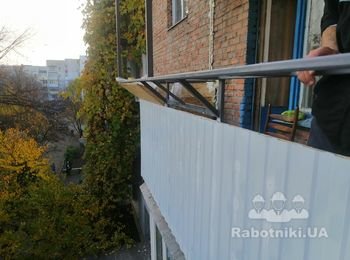 Вынос балкона, обшивка профнастилом, остекление