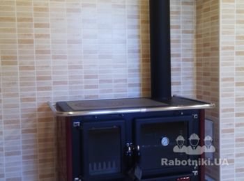 Італійська плита-духова піч з функцією нагріву приміщення. Потужність 6 кВт. Монтаж проведений в димохідну систему Schiedel UNI.