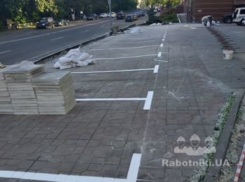 разметка парковочных мест машинкой для разметки
