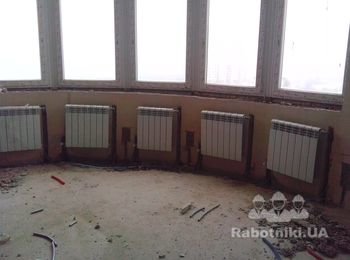 Установка радиаторов под каждое окно,с переделкой подводящих магистралей.