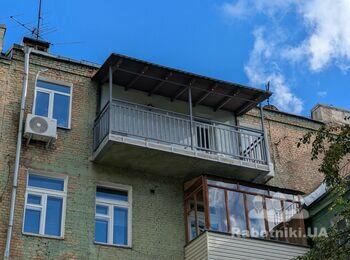 Остаточно, після відновлення балкон виглядає так. Але огородження робили не ми.