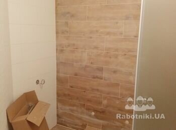 Облицювання стін плиткою під ключ. Чисто, надійно, красиво.