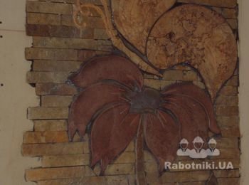 художественное оформление печки природным камнем.
