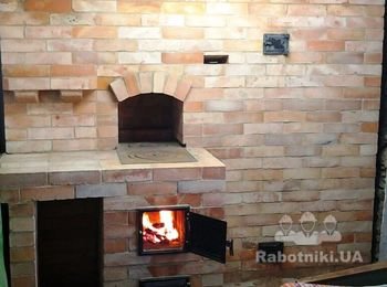 Двухколпаковая печка с варочной плитой.