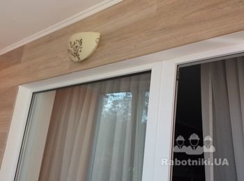 Балкон- утеплення+поклейка ламінату на стіни