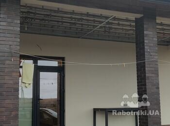 Влаштування дерев'яних перил на терасі з механізмом жалюзі