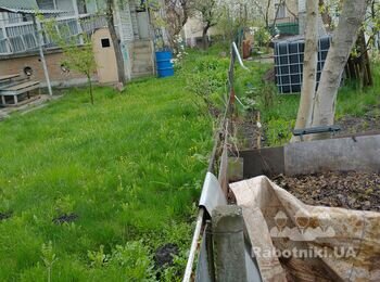 Заливка відмостки, бетонна підлога в гараж, паркан.