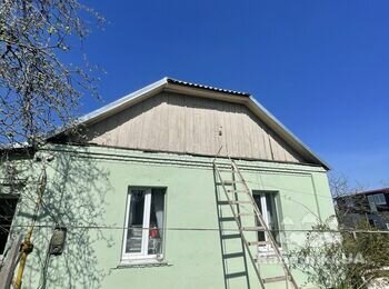 Зашити фронтон профнастилом