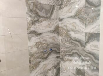 Поправить швы на плитке гравером