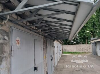Изготовление и установка козырька над воротами в гараж