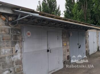 Изготовление и установка козырька над воротами в гараж