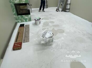 Укладання ламинату SPC SolidCORE та встановлення алюмінієвого плінтуса