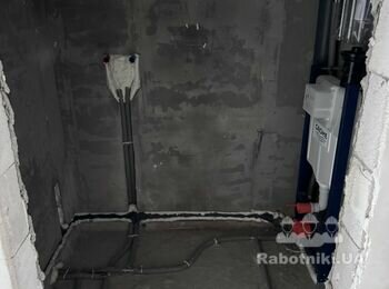 Облаштування санвузла, укладання плитки в новобудові.