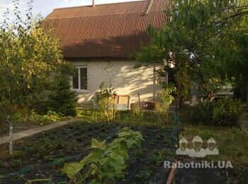 Утеплення і монтаж металосайдінга фасада дачного будинку