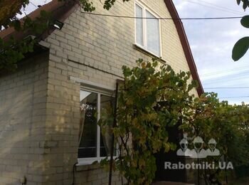 Утеплення і монтаж металосайдінга фасада дачного будинку