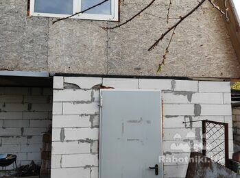 Виконання робіт з утеплення фасаду житлового будинку і сараю