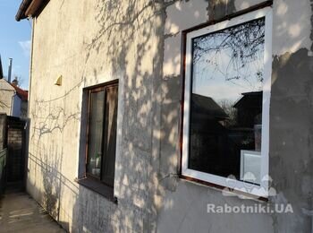 Виконання робіт з утеплення фасаду житлового будинку і сараю