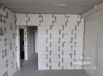 Машинна штукатурка стін.