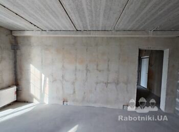 Машинна штукатурка стін.