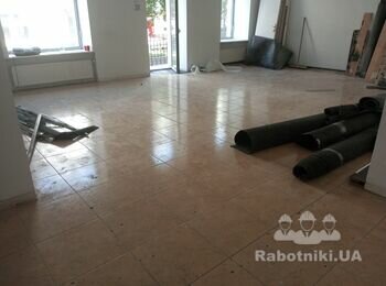 Укладання 160м2 плитки на підлогу.