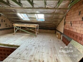 Обшивка мансарди фальшбрусом