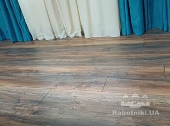 Переукладка ламината 85м2