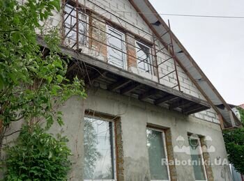 Отделка фронтона частного дома сайдингом
