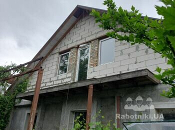 Отделка фронтона частного дома сайдингом