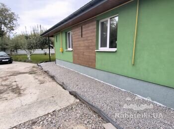 Вкладання бруківки на дренажовану відмостку