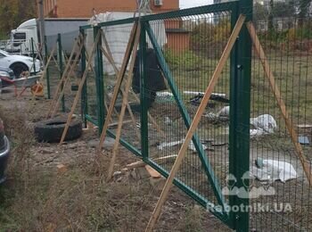 Монтаж паркану в області