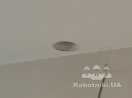 Збільшити отвір в натяжній стелі, встановити вентилятор і світильник