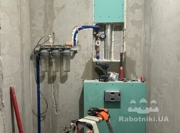 Облицювання керамогранітом душова і туалет.