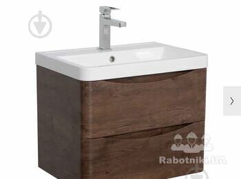 Вирізати в тумбі лобзиком додатковий отвір для каналізації