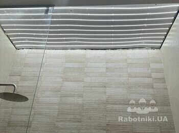 Натяжна стеля для світлової панелі.