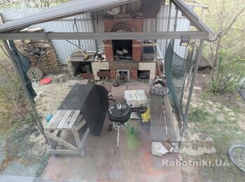 Обшити металеві опори для бесідки та навісу