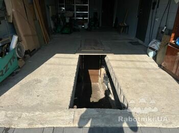 Зробити підлогу в гаражі та покласти на фасаді плитку під цеглу