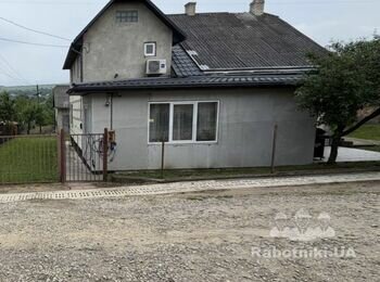 Фасад зашити сайдингом