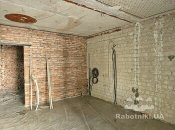 Шпаклівка по маякам цегляної стіни приблизно 29 кв. м.