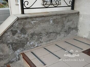 Облицювати сходи офісної будівлі бетонною плиткою