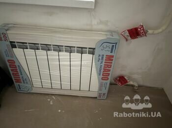 Установить два радиатора отопления