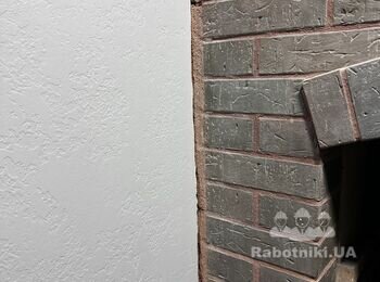 Облицювання примикання каміну до стіни шпакльованої