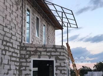 Навес и обкладка дымохода плиткой