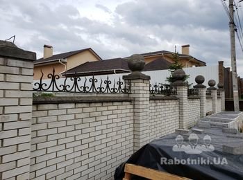Поднять(доложить кирпичем) забор из кирпича.